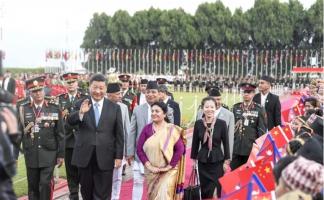 Xi